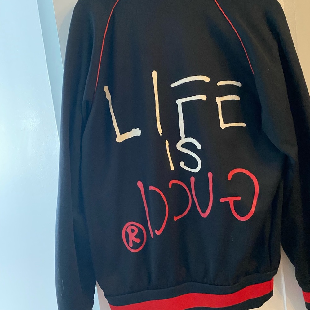 Gucci track jacket.